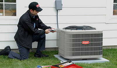 Technicians Repairing Trane Heating System